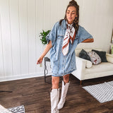 Denim Diva energy meets versatile style. This batwing beauty shifts from jacket to shirt to dress—layer it over everything or let it stand solo. Medium wash, metal button details, and flattering seam work make it endlessly cool. 