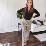  The MIX MATCH LEOPARD STRIPE PANT blends bold brown and cream stripes on one leg with fierce leopard print on the other—all in a soft, denim-like fabric that feels as good as it looks. The elastic back waist keeps you comfy while the button and zipper front keeps things polished. 