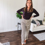  The MIX MATCH LEOPARD STRIPE PANT blends bold brown and cream stripes on one leg with fierce leopard print on the other—all in a soft, denim-like fabric that feels as good as it looks. The elastic back waist keeps you comfy while the button and zipper front keeps things polished. 