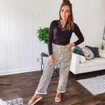 This black baby rib top is your new closet essential. The delicate lace inset at the V neckline adds just enough intrigue, while the ribbed texture and generous stretch make it impossibly comfortable.