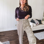  The MIX MATCH LEOPARD STRIPE PANT blends bold brown and cream stripes on one leg with fierce leopard print on the other—all in a soft, denim-like fabric that feels as good as it looks. The elastic back waist keeps you comfy while the button and zipper front keeps things polished. 