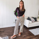  The MIX MATCH LEOPARD STRIPE PANT blends bold brown and cream stripes on one leg with fierce leopard print on the other—all in a soft, denim-like fabric that feels as good as it looks. The elastic back waist keeps you comfy while the button and zipper front keeps things polished. 