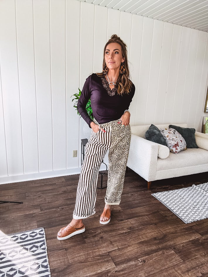  The MIX MATCH LEOPARD STRIPE PANT blends bold brown and cream stripes on one leg with fierce leopard print on the other—all in a soft, denim-like fabric that feels as good as it looks. The elastic back waist keeps you comfy while the button and zipper front keeps things polished. 