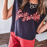 This sleek black cotton tank features a fierce leopard print "stay wild" graphic trimmed in vibrant red, giving you that edgy, untamed vibe.