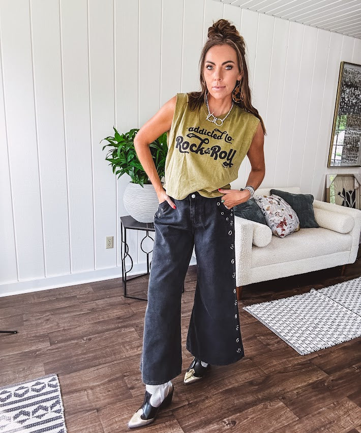 Washed olive tank with bold black "Addicted to Rock & Roll" graphic and shorter hemline. 100% Cotton.