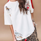 Ivory tee featuring western inspired graphics.