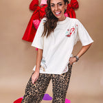 Ivory tee featuring western inspired graphics.