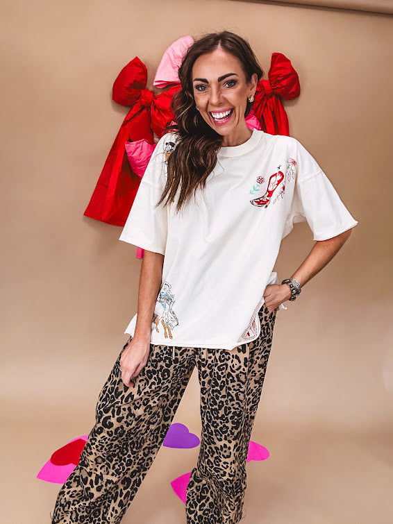 Taupe and black leo joggers with drawstring waist and wide leg.