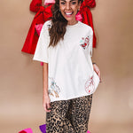 Ivory tee featuring western inspired graphics.