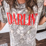 Light camo cotton tee with a bold, contrasting red "DARLIN'" graphic