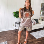 Soft brown cotton tee that celebrates the beautiful chaos of motherhood with cream and orange "Raising Untamed Savage Wild Things - Mom Life" graphics and a bold tiger motif.