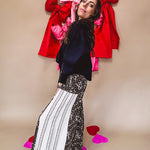 Cotton wide leg pants in a dark chocolate, white and black leo print with a white and black wide stripe panel down the side with button fly.