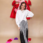 Round neck, crew style cropped sweater with drop shoulder available in black, white and wine.