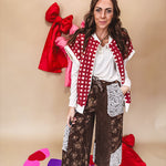 Burgundy and ivory window pane checkered sherpa vest with zipper front.