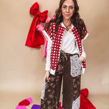 Burgundy and ivory window pane checkered sherpa vest with zipper front.