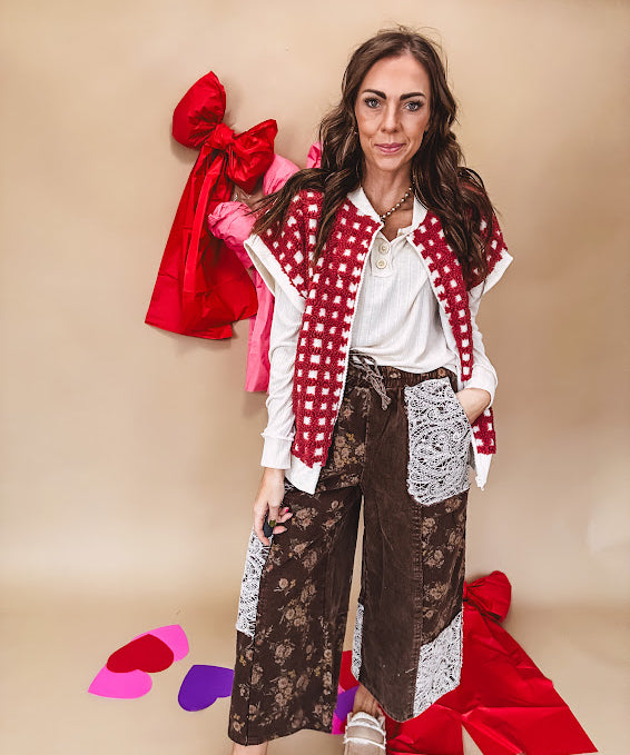 Burgundy and ivory window pane checkered sherpa vest with zipper front.