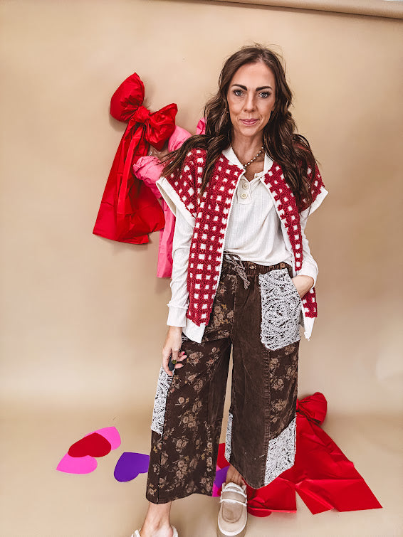 Burgundy and ivory window pane checkered sherpa vest with zipper front.