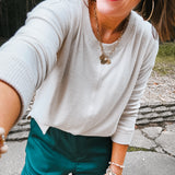 Soft brushed Hacci style pullover with long sleeves.