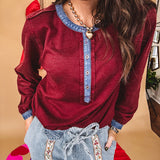 Burgundy Henley style long sleeved top with denim trim at 1/4 button down front, collar and cuffs.