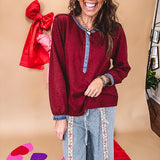 Burgundy Henley style long sleeved top with denim trim at 1/4 button down front, collar and cuffs.