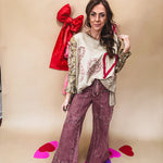 Washed wine colored wide leg cargo pants with drawstring waist.