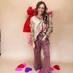 Washed wine colored wide leg cargo pants with drawstring waist.