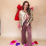 Washed wine colored wide leg cargo pants with drawstring waist.