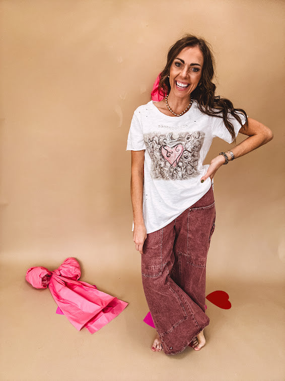 Washed wine colored wide leg cargo pants with drawstring waist.
