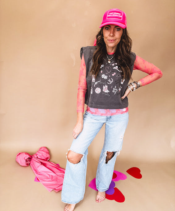 Bubblegum pink sheer long sleeved mesh with floral clusters throughout.