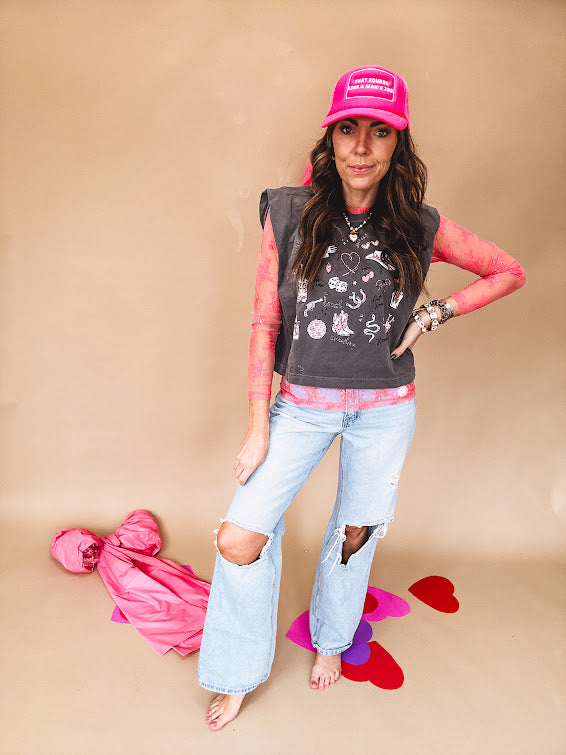 Bubblegum pink sheer long sleeved mesh with floral clusters throughout.