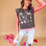Bubblegum pink sheer long sleeved mesh with floral clusters throughout.