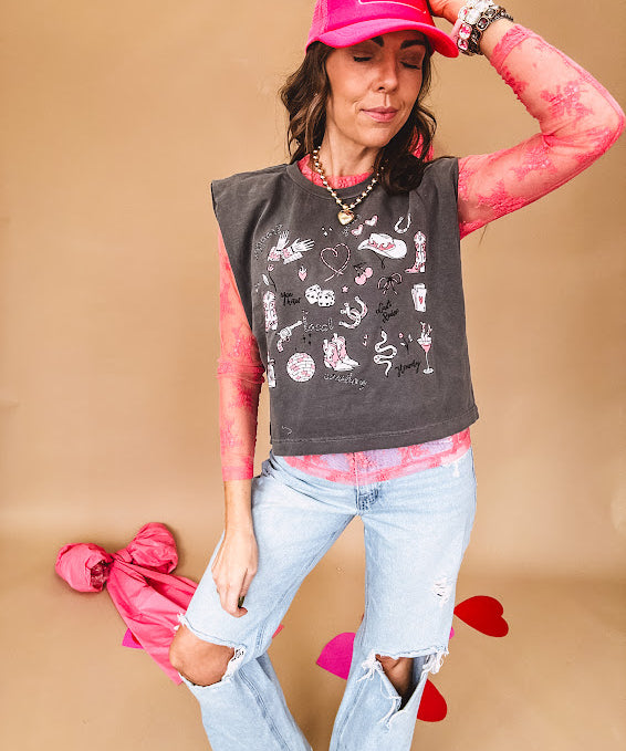 Bubblegum pink sheer long sleeved mesh with floral clusters throughout.