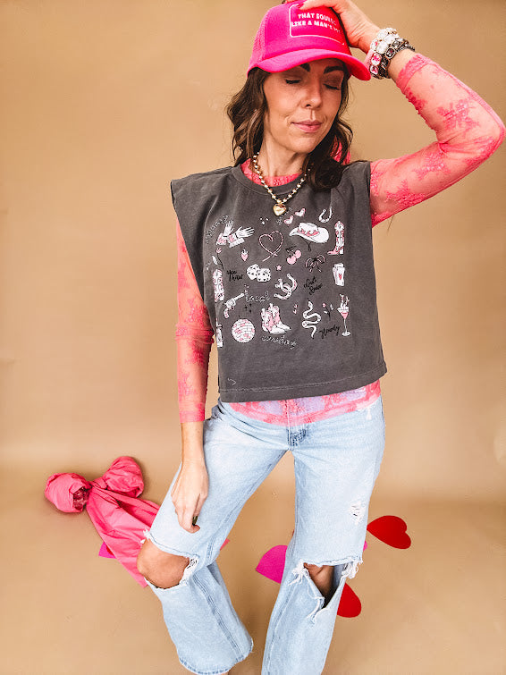 Bubblegum pink sheer long sleeved mesh with floral clusters throughout.
