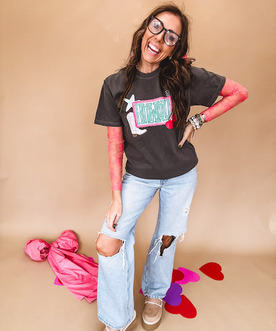Charcoal cotton tee with pink, teal, white and red and "Howdy", cherries and a white and black checkered lightning bolt graphics.