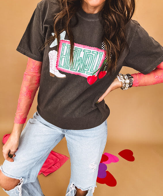 Charcoal cotton tee with pink, teal, white and red and "Howdy", cherries and a white and black checkered lightning bolt graphics.
