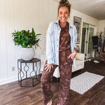 Light blue acid wash shacket, cotton with a terry-like feel, oversized front pockets, a classic collar, and chunky silver buttons, rounded hem and relaxed fit.