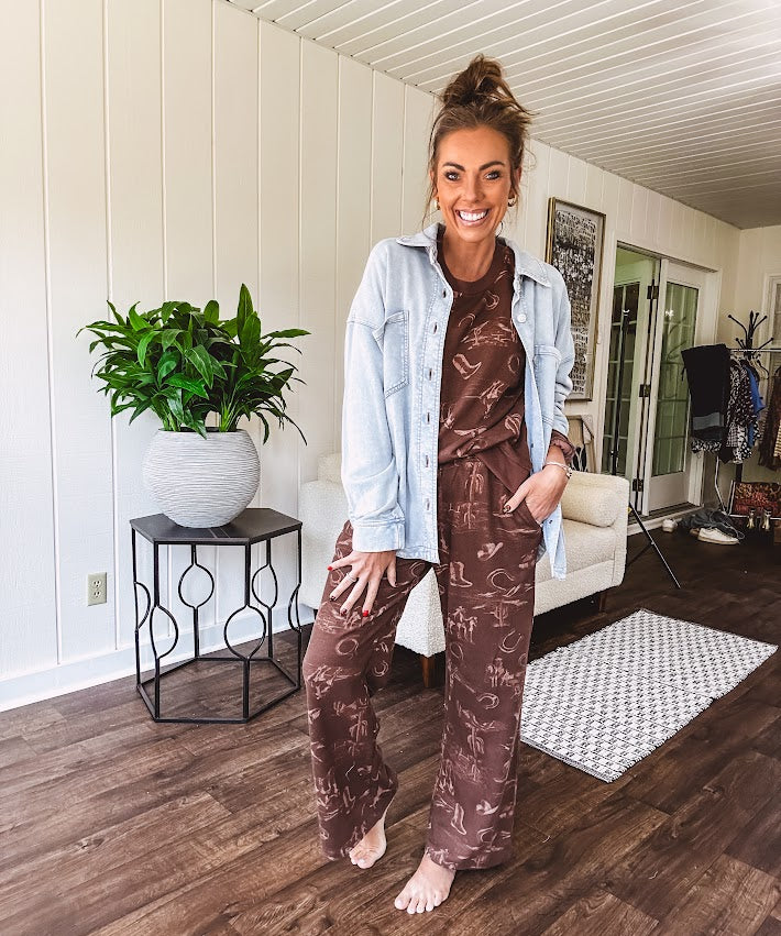 Light blue acid wash shacket, cotton with a terry-like feel, oversized front pockets, a classic collar, and chunky silver buttons, rounded hem and relaxed fit.