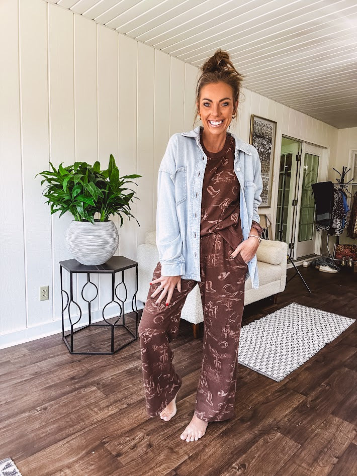 Light blue acid wash shacket, cotton with a terry-like feel, oversized front pockets, a classic collar, and chunky silver buttons, rounded hem and relaxed fit.