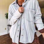 Light blue acid wash shacket, cotton with a terry-like feel, oversized front pockets, a classic collar, and chunky silver buttons, rounded hem and relaxed fit.