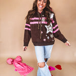 Charcoal hoodie with pink stripes, inside of hood and white and floral star patchwork throughout.