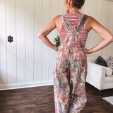 Waffle texture tank with deep round neckline and functional 1/4 button front and wide straps.