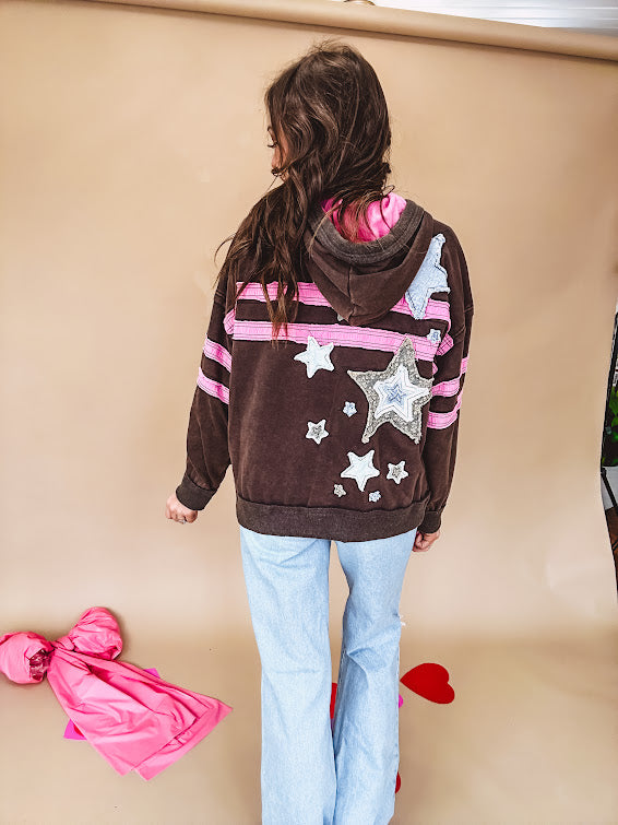 Charcoal hoodie with pink stripes, inside of hood and white and floral star patchwork throughout.