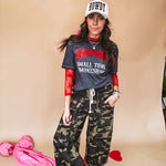 Long sleeved sheer red mesh with floral bundles throughout.