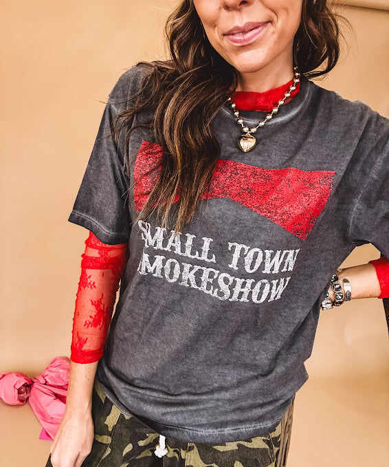 Long sleeved sheer red mesh with floral bundles throughout.