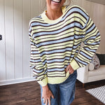 Butter yellow striped knit top with horizontal stripes in dark brown and light blue, a relaxed fit and square hem.