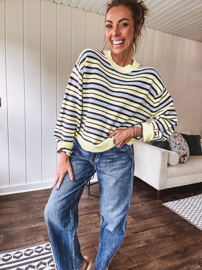 Butter yellow striped knit top with horizontal stripes in dark brown and light blue, a relaxed fit and square hem.