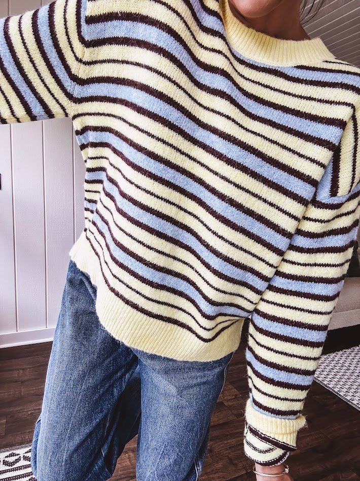 Butter yellow striped knit top with horizontal stripes in dark brown and light blue, a relaxed fit and square hem.