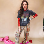 Cotton straight leg ethnic print pants in muted magenta, cream, red, blue and mustard.