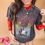 Long sleeved sheer red mesh with floral bundles throughout.