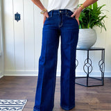 Soft comfort-stretch denim with an easy, flexible fit
Flattering mid-rise waist
Classic five-pocket design
Full-length wide-leg silhouette
Features a trouser-inspired front fold crease detail
Finished hem for a polished look
Dark wash denim